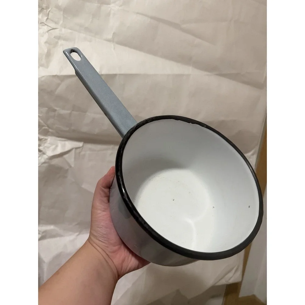 vintage light blue enamelware saucepan